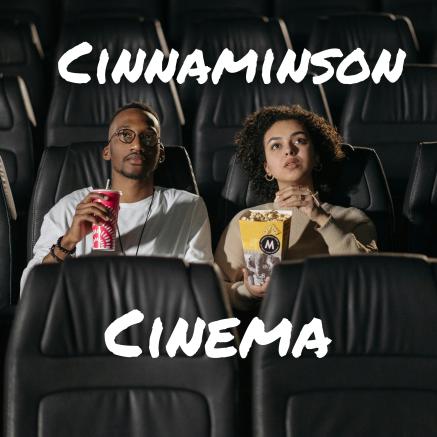 A couple sits in a movie theater with snacks. The text reads "Cinnaminson Cinema".