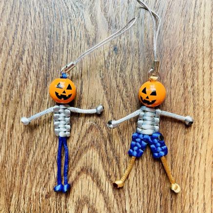 Mini pumpkin man made out of macrame