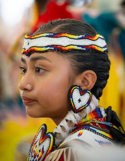 Native American Girl in traditional clothing.