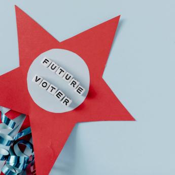 A star with ribbons that says Future Voter.