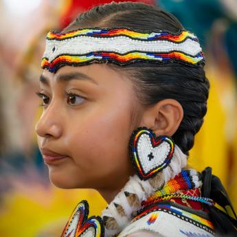 Native American Girl in traditional clothing.